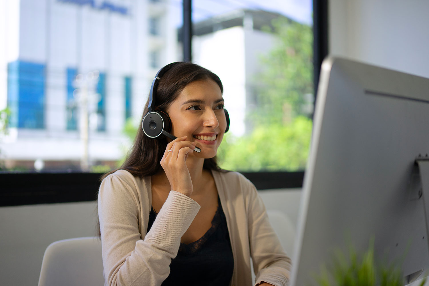White collar worker is working with computer at office